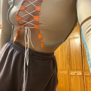 Open front crop top. Brand new, never worn. Very versatile.